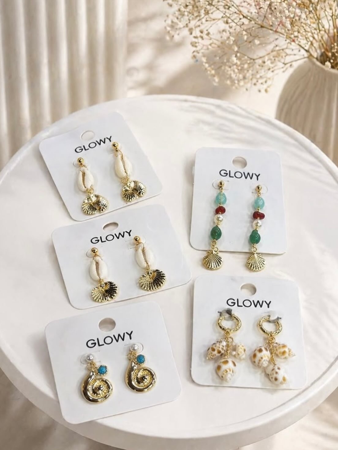 Damla formunda sarkantılı küpe seti - 'GLOWY' markalı